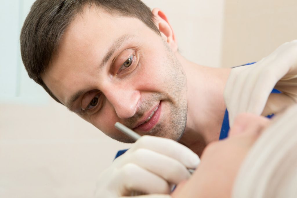 Dental Exam With Dentist